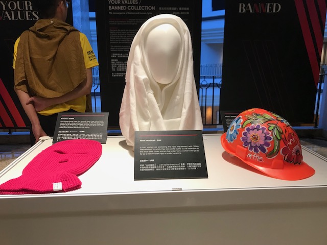 A balaclava, hijab, and helmet
