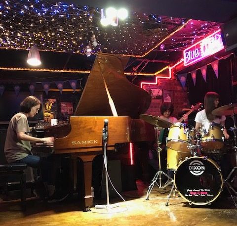 jazz combo: piano, drums, bass