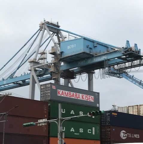 Shipping containers and a loading crane