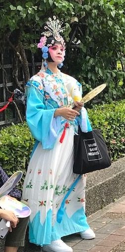 A person in a Chinese opera costume.