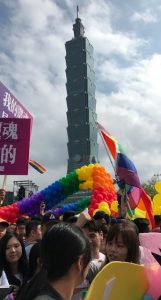 Taipei 101 with a crowd in front.