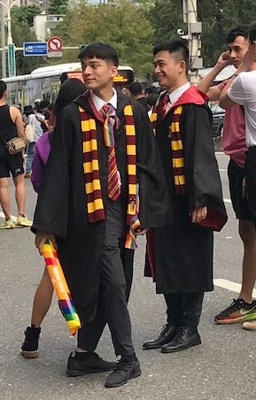 Two young men dressed as Gryfindors.