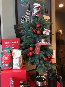 A small Christmas tree in Starbucks.