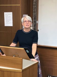 Shelley Rigger at a lectern