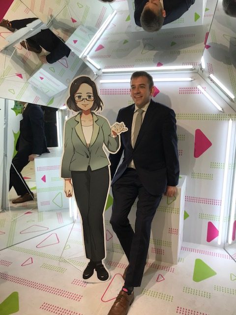 Kharis Templeman with a cardboard cut out of Tsai Ing-wen.