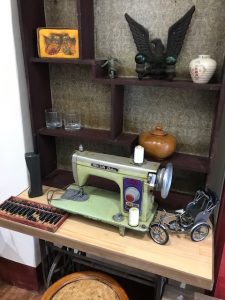 An antique sewing machine and other knick-knacks.