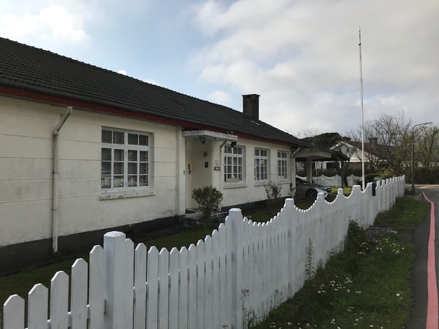 House behind a picket fence